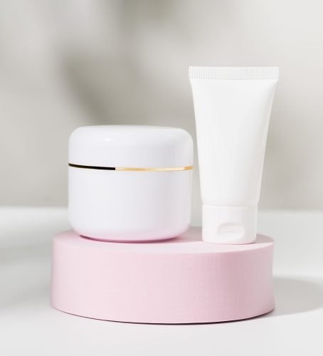 White cosmetic bottle on podium, ingredients for skin care and treatment vitamin, packaging product for mockup.